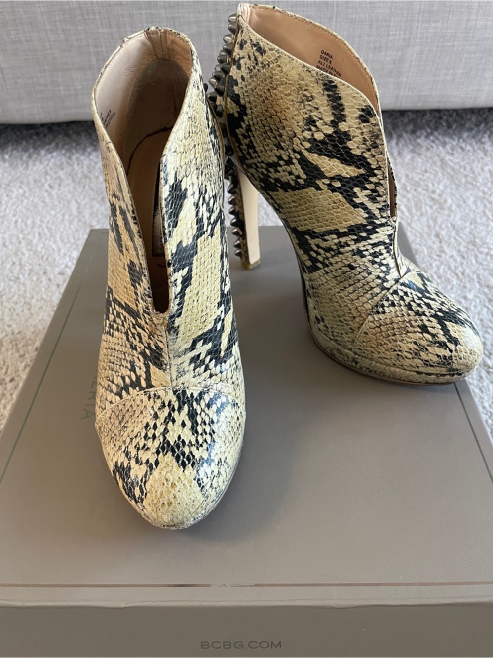 BCBG Snake-Print Stiletto Booties in Natural and Black